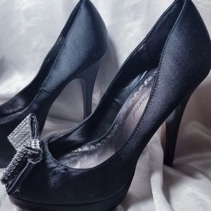 Black bow heels